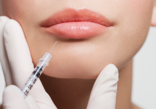 close-up-of-woman-receiving-botox-injection-in-lips-picture-id147206877 (1)